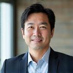 リードデータアナリストの田中健太氏のポートレート